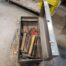 Used Tool Box Full Of Pipe Wrenches And Hammers